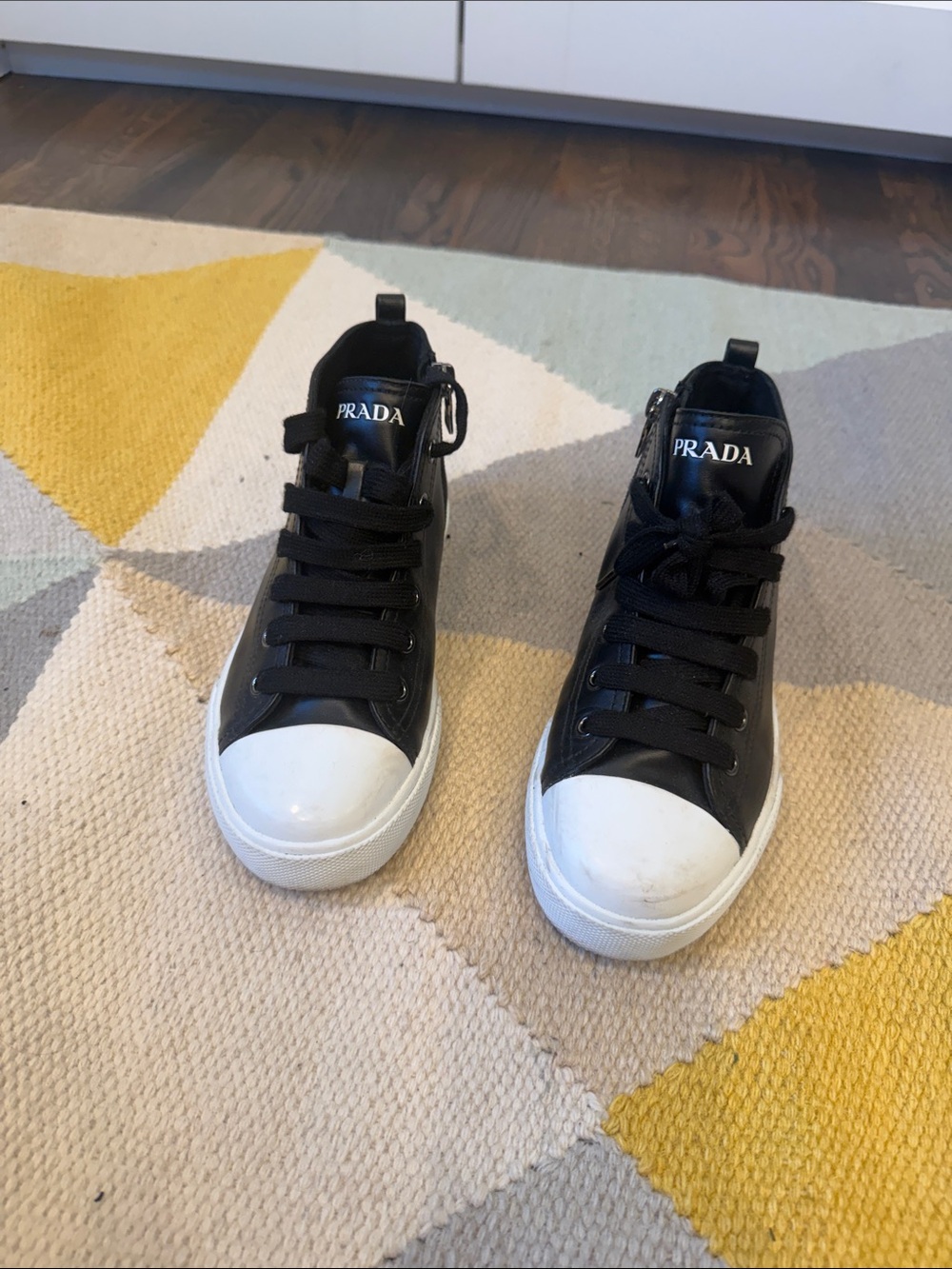 Prada Black Leather Kids high top Sneakers with White Toe Caps